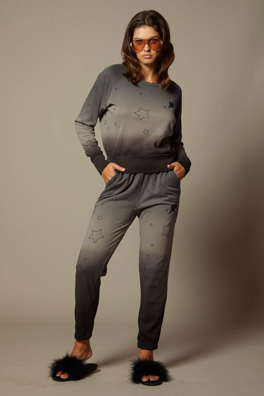 THE SABINE SWEATSHIRT IN MIDNIGHT OMBRE DYE WITH ALL OVER STAR EMBROIDERY