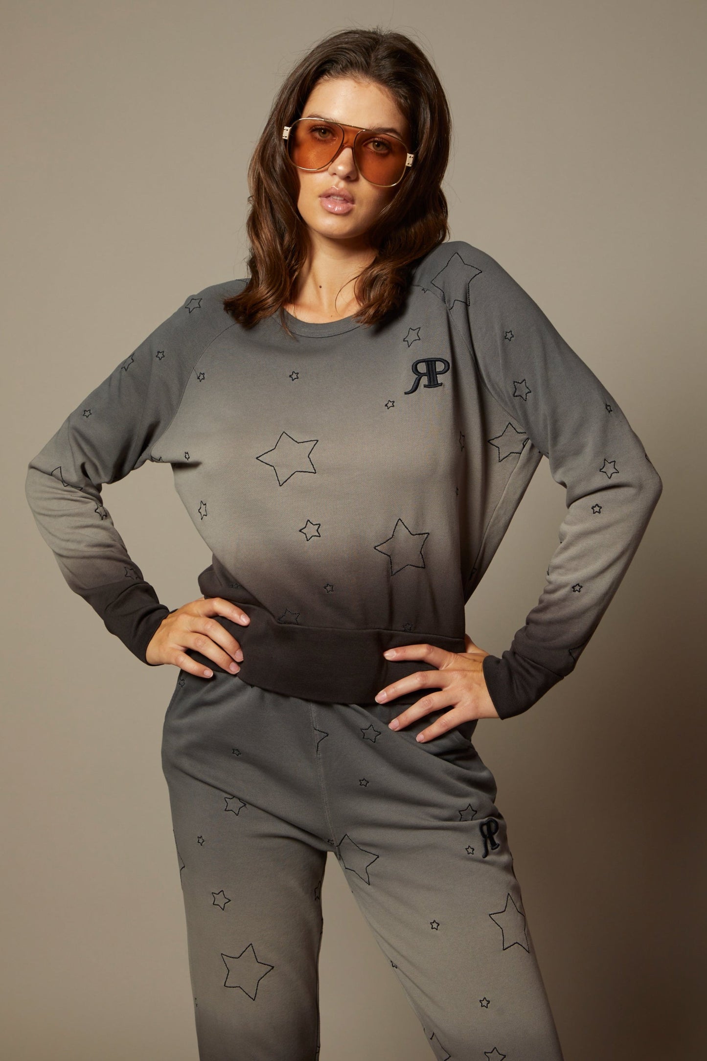 THE SABINE SWEATSHIRT IN MIDNIGHT OMBRE DYE WITH ALL OVER STAR EMBROIDERY