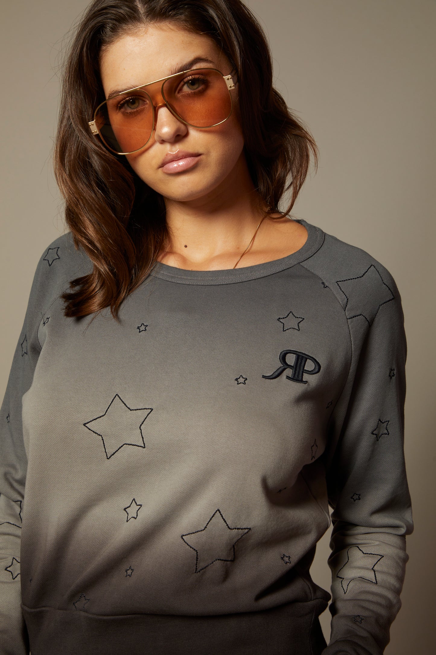 THE SABINE SWEATSHIRT IN MIDNIGHT OMBRE DYE WITH ALL OVER STAR EMBROIDERY