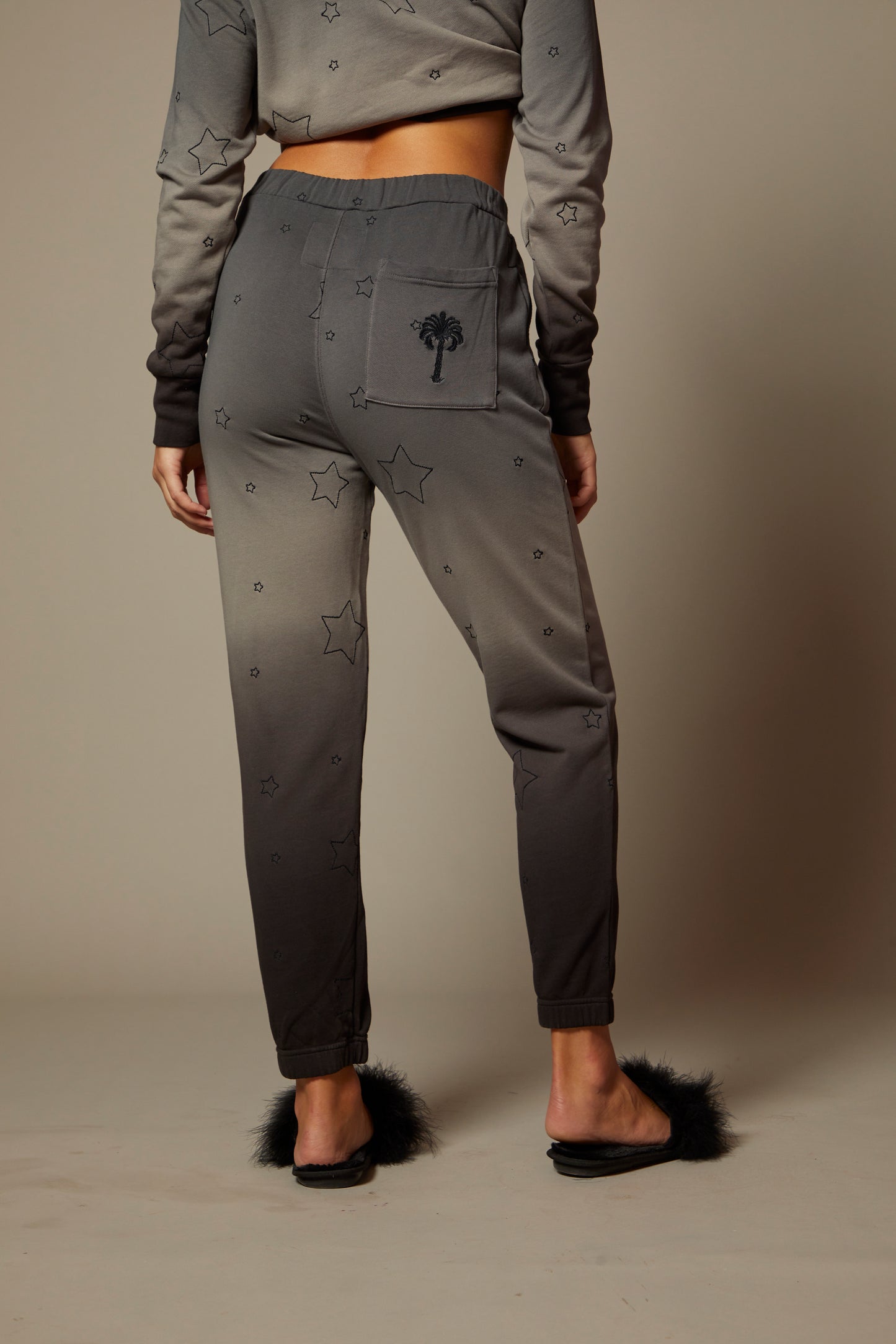 THE AMELIE JOGGER IN MIDNIGHT OMBRE DYE WITH ALL OVER STAR EMBROIDERY