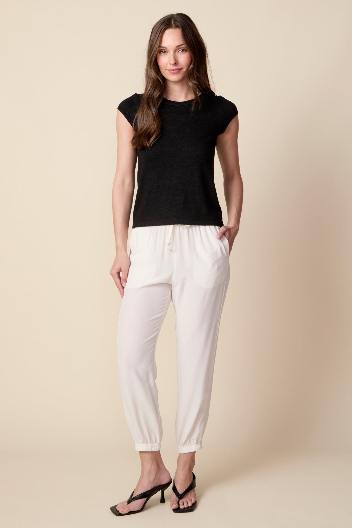 THE OLIVIA SILK JOGGER IN GARDENIA - ROYAL PALMS love & legacy