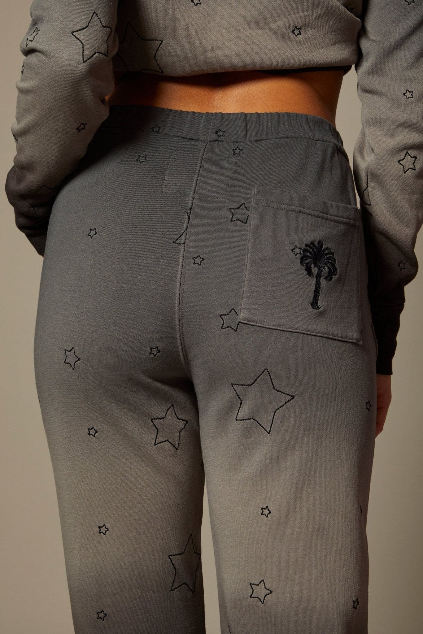 THE AMELIE JOGGER IN MIDNIGHT OMBRE DYE WITH ALL OVER STAR EMBROIDERY - ROYAL PALMS love & legacy