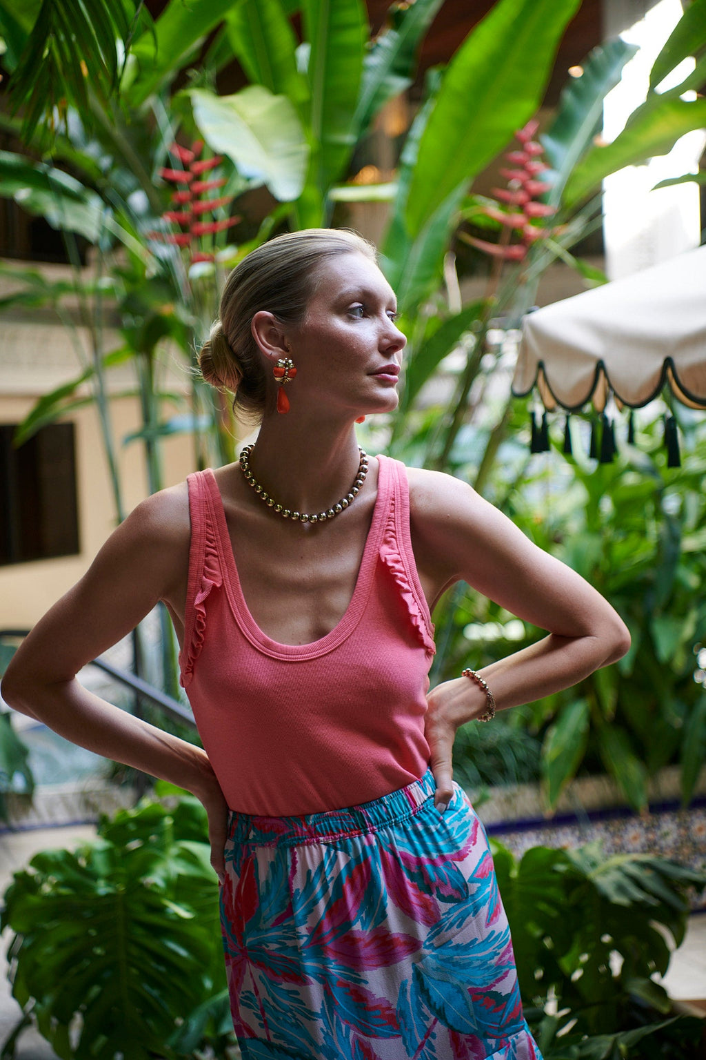 THE ELLA RUFFLE RIB TANK IN IN BRIGHT CORAL - BACK TO FRONT - ROYAL PALMS love & legacy