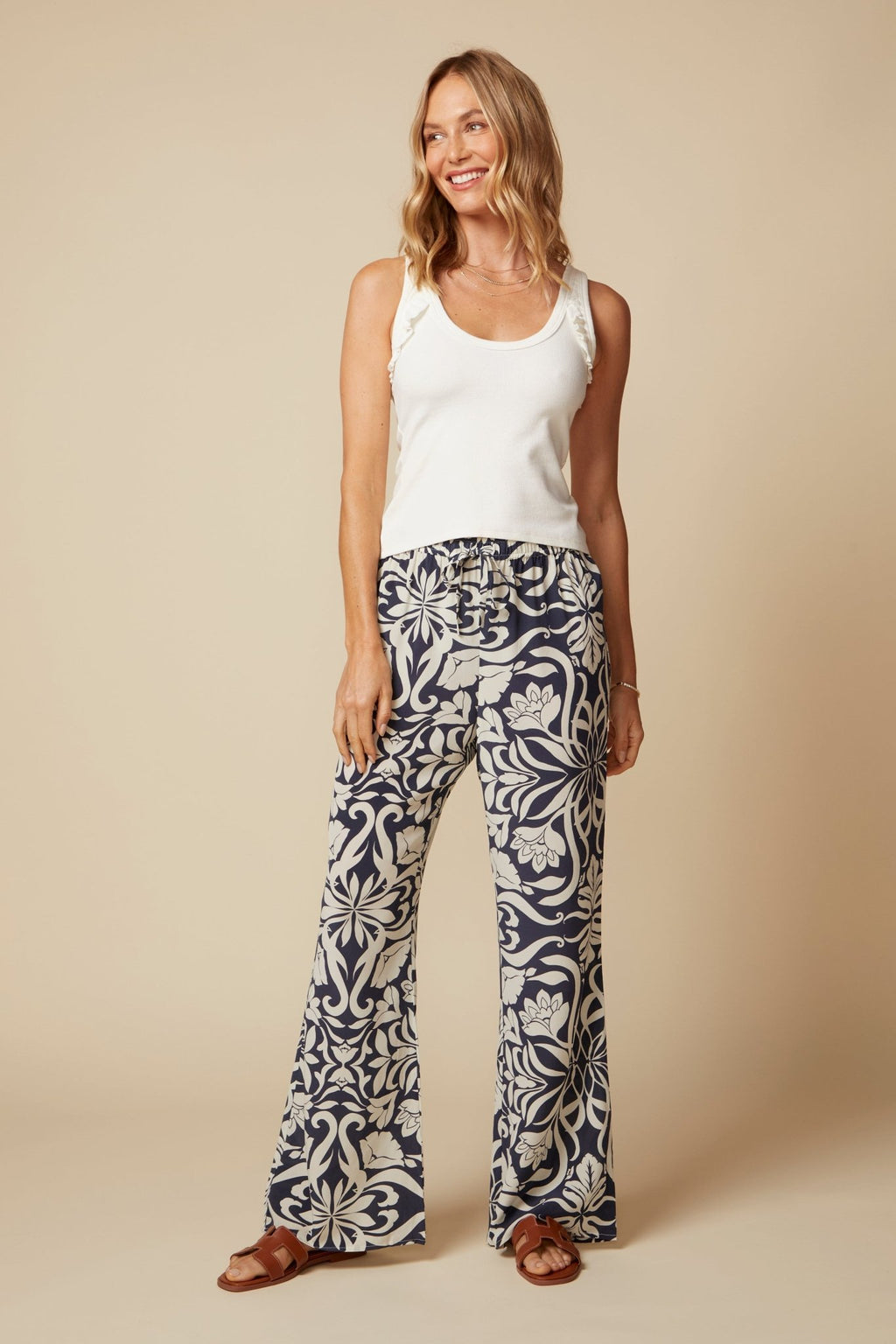 THE ELLA RUFFLE RIB TANK IN VINTAGE WHITE - ROYAL PALMS love & legacy