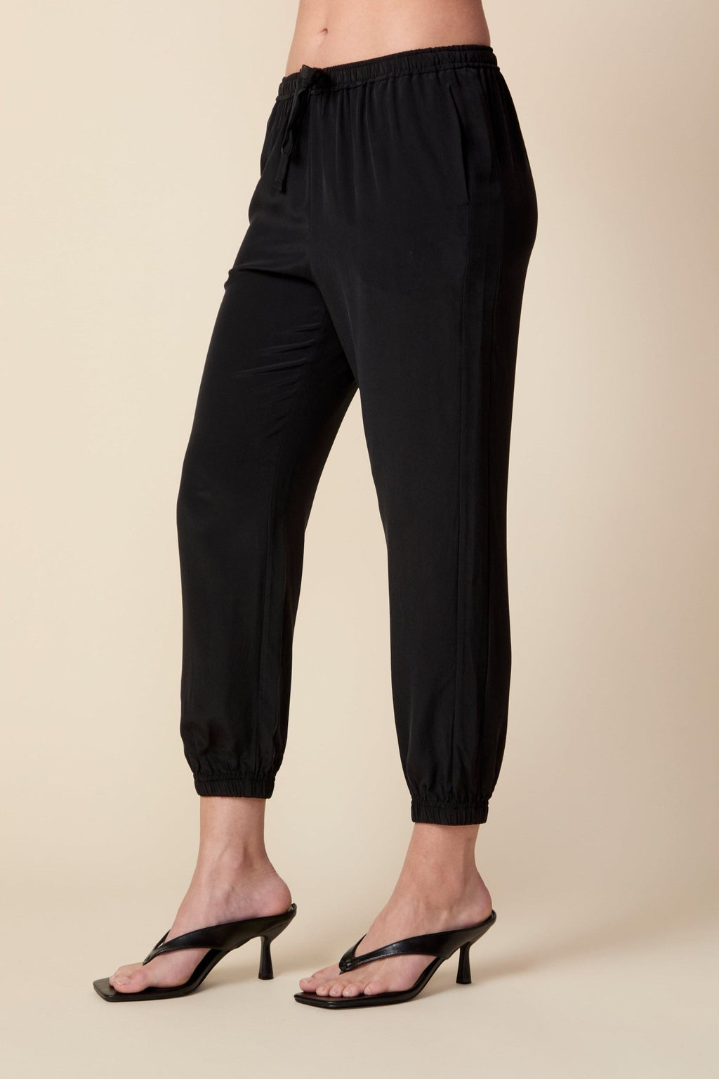 THE OLIVIA SILK JOGGER IN BLACK - ROYAL PALMS love & legacy