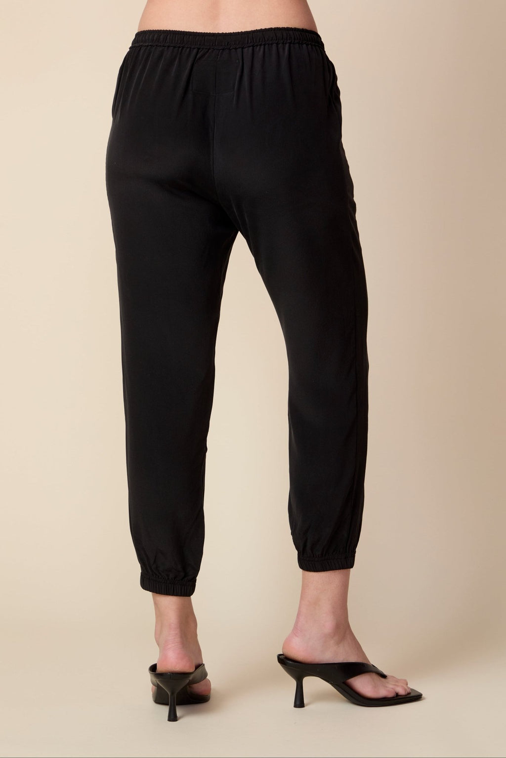 THE OLIVIA SILK JOGGER IN BLACK - ROYAL PALMS love & legacy