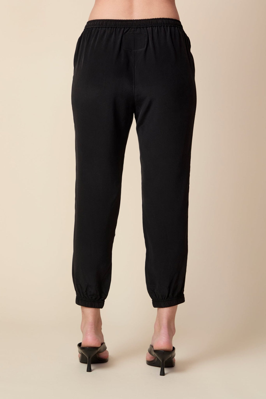 THE OLIVIA SILK JOGGER IN BLACK - ROYAL PALMS love & legacy