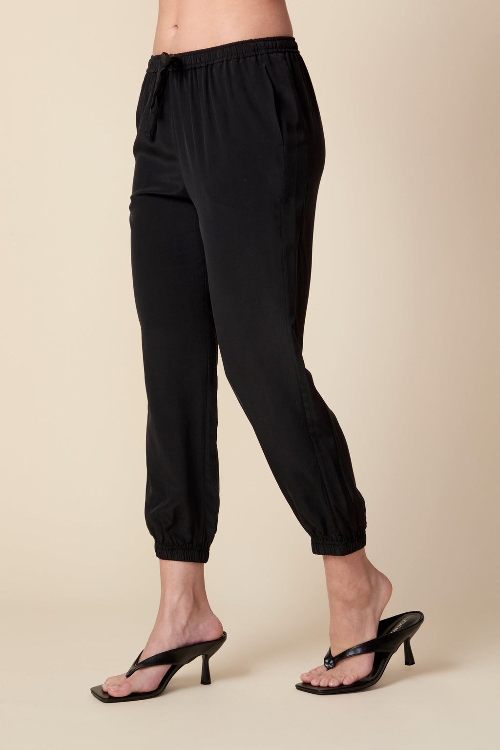 THE OLIVIA SILK JOGGER IN BLACK - ROYAL PALMS love & legacy