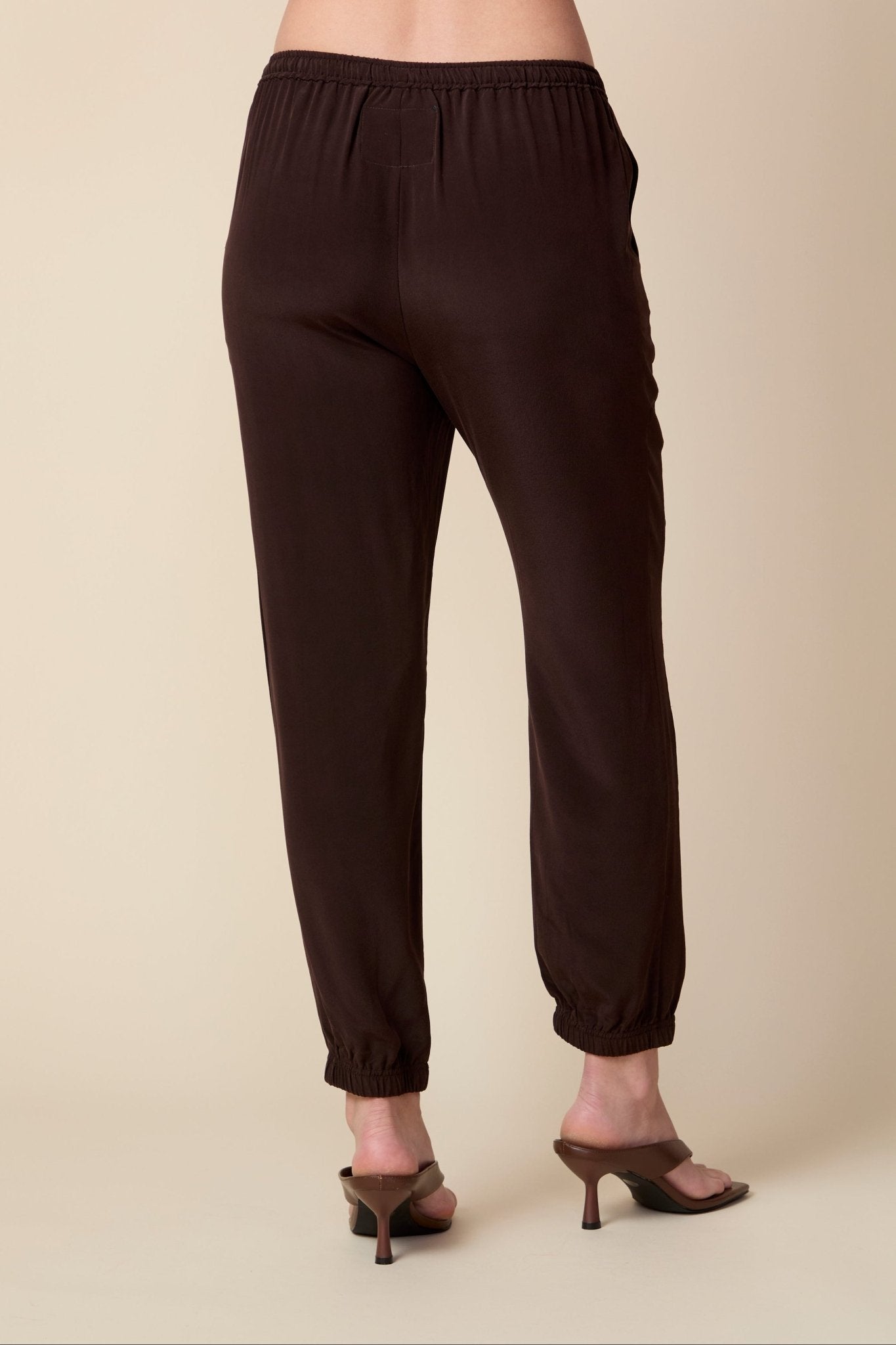 THE OLIVIA SILK JOGGER IN COFFEE BEAN BROWN - ROYAL PALMS love & legacy