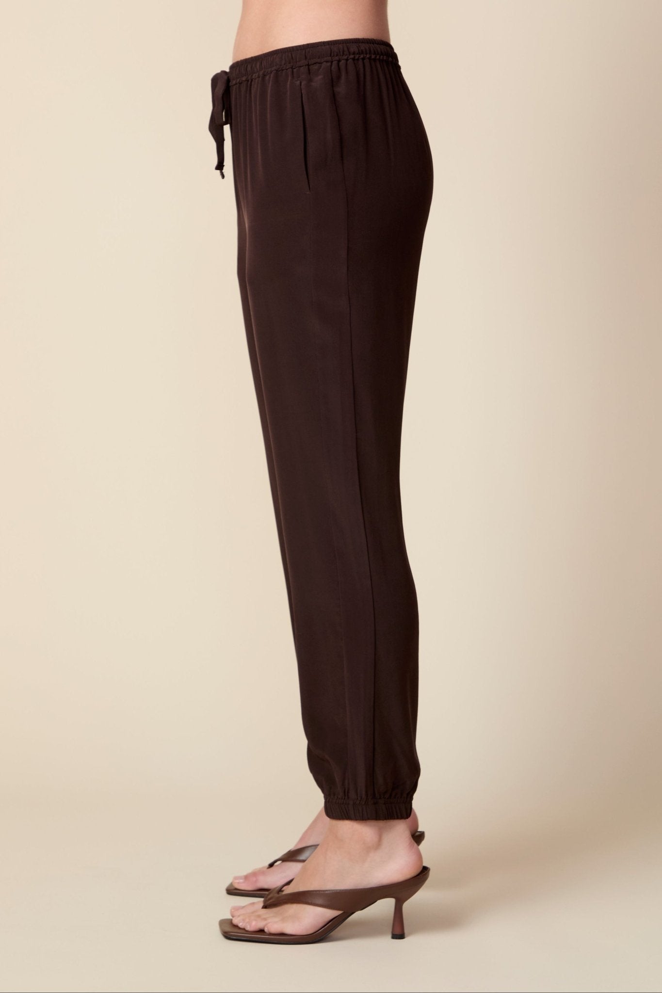THE OLIVIA SILK JOGGER IN COFFEE BEAN BROWN - ROYAL PALMS love & legacy