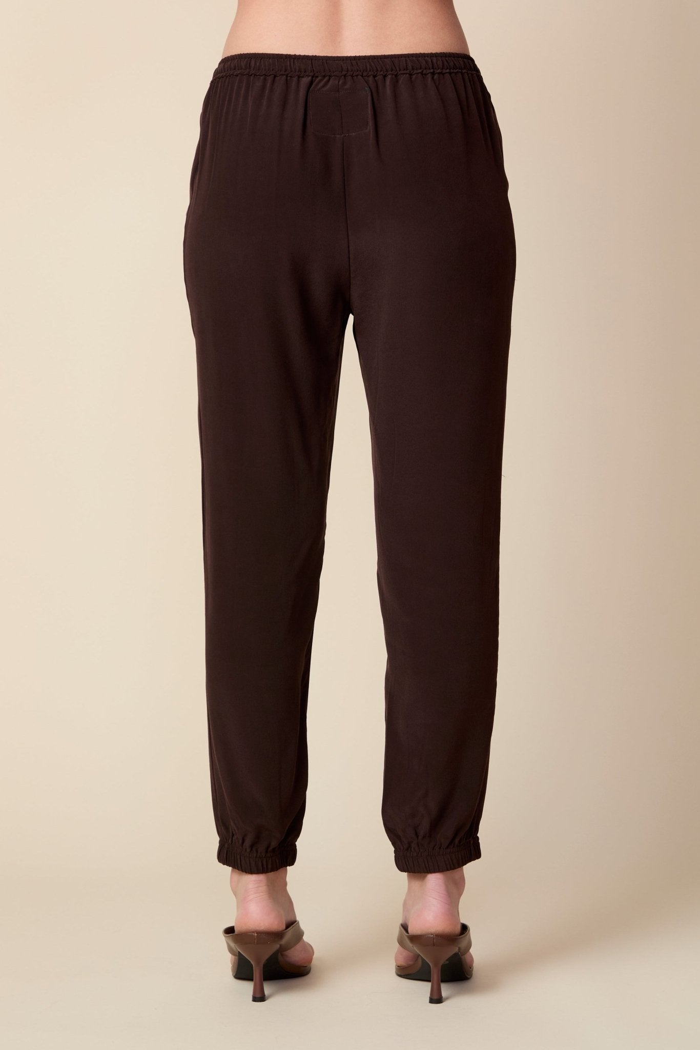 THE OLIVIA SILK JOGGER IN COFFEE BEAN BROWN - ROYAL PALMS love & legacy