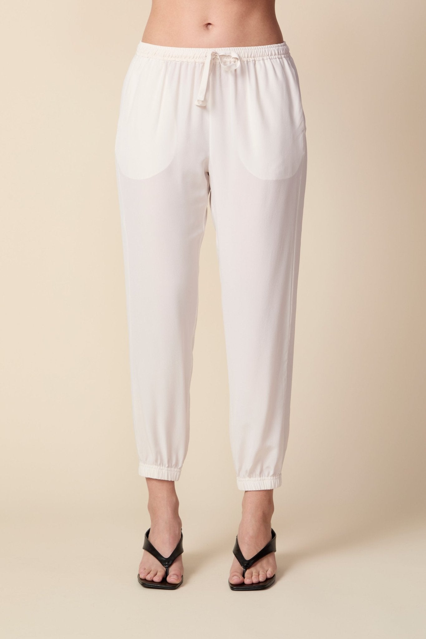 THE OLIVIA SILK JOGGER IN GARDENIA - ROYAL PALMS love & legacy